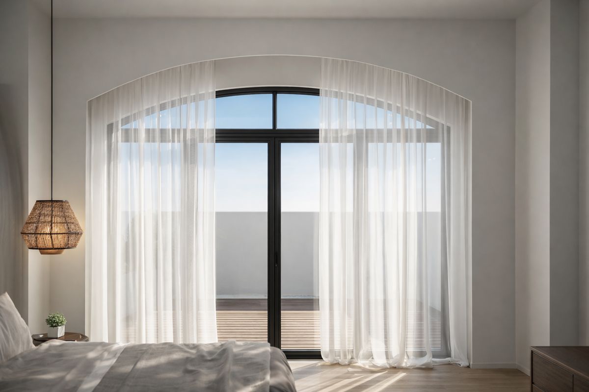 Bedroom with arch headboard